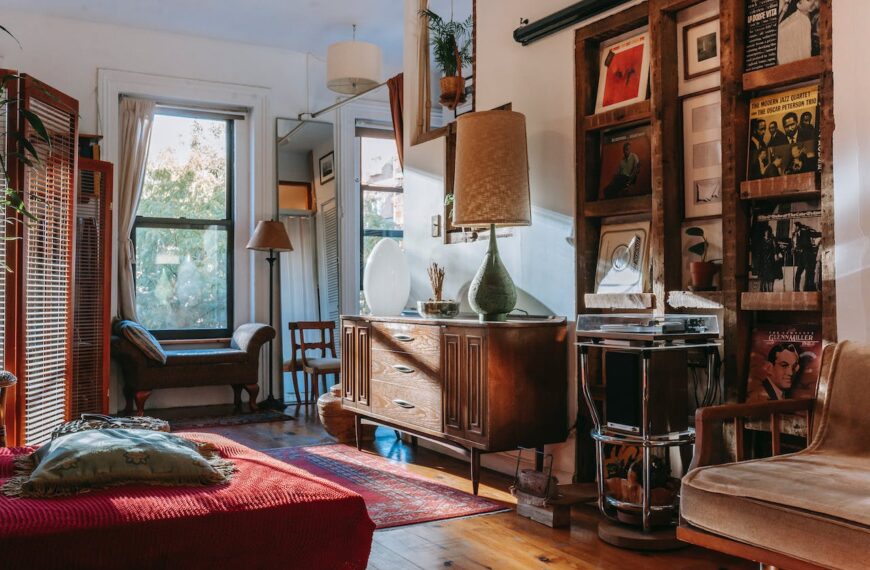 Photo by Charlotte May: https://www.pexels.com/photo/interior-of-cozy-studio-with-bed-and-couch-decorated-with-vintage-furniture-and-vinyl-records-5824519/